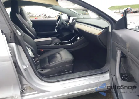 2018 Tesla Model 3 Long Range/Mid Range from USA, damaged, VIN 5YJ3E1EA0JF004087